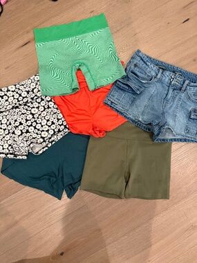 A lot of six size small biker, denim, and lounge shorts.